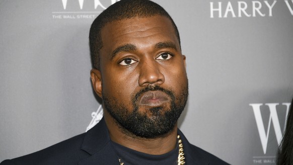 FILE - In this Nov. 6, 2019, file photo, Kanye West attends the WSJ. Magazine 2019 Innovator Awards at the Museum of Modern Art in New York. The rap superstar will design adult and kids&#039; clothing ...