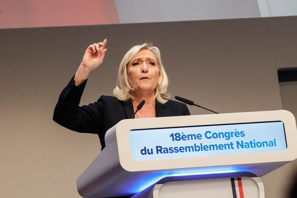 epa10287615 Marine Le Pen, ex-president of France&#039;s far right Rassemblement National (RN) party, addresses the 18th RN party Congress in Paris, France, 05 November 2022. The congress chose Eurode ...