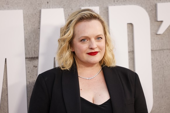 epa12006597 Elisabeth Moss attends the season six premiere of the television series ?The Handmaid?s Tale? at the TCL Chinese Theatre in Los Angeles, California, USA, 02 April 2025. EPA/CAROLINE BREHMA ...