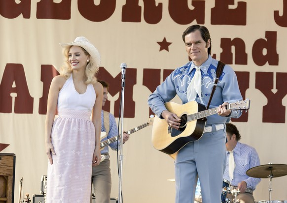This image released by Showtime shows Michael Shannon as George Jones, right, and Jessica Chastain as Tammy Wynette in a scene from "George & Tammy," premiering Dec. 4. (Dana Hawley/Show ...