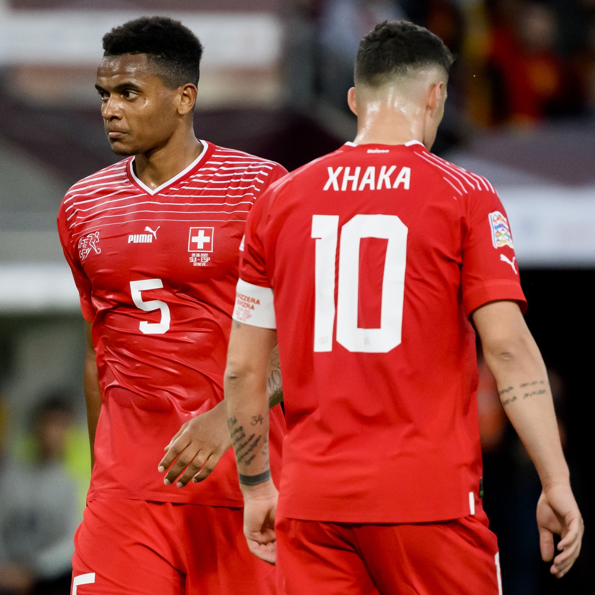 Switzerland's defender Manuel Akanji, left, and Switzerland's midfielder Granit Xhaka, right, react during the UEFA Nations League group A2 soccer match between Switzerland and Spain at the  ...