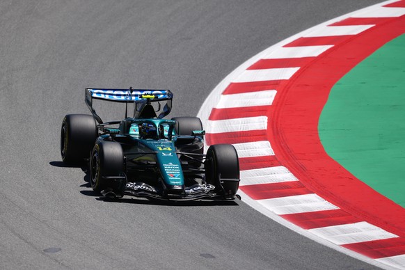 epa13032891 Spanish driver Fernando Alonso from the Aston Martin team in action during the first free training session for the Formula One Grand Prix of Barcelona-Catalunya, in Montmelo, Spain, 12 Jun ...