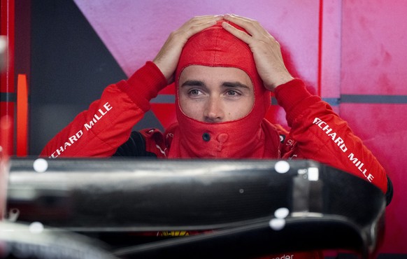Ferrari driver Charles Leclerc, gets ready during the third practice session at the Formula One Canadian Grand Prix in Montreal, Saturday, June 18, 2022. (Paul Chiasson/The Canadian Press via AP)