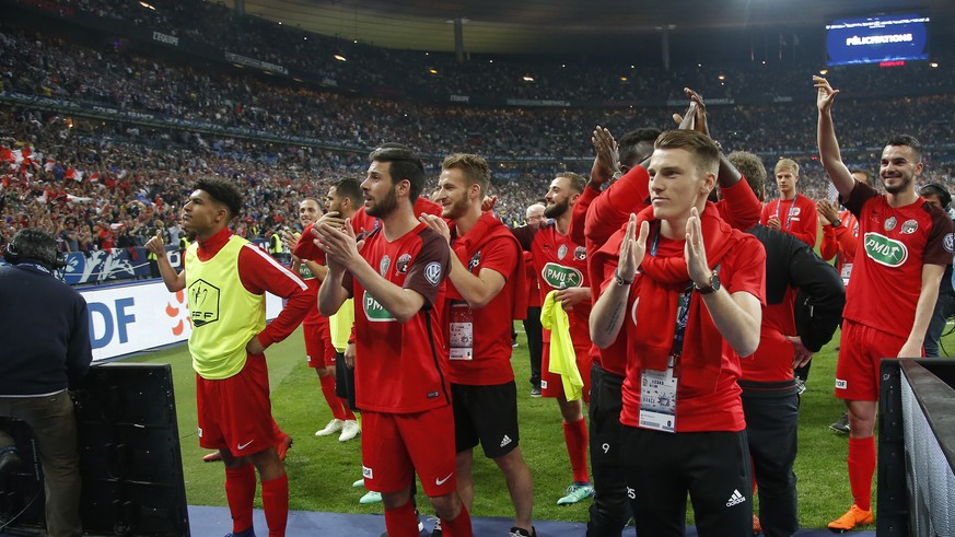 Les Herbiers&#039; players acknowledge the applause from their supporters at the end of the French Cup soccer final against Paris Saint Germain at the Stade de France stadium in Saint-Denis, outside P ...