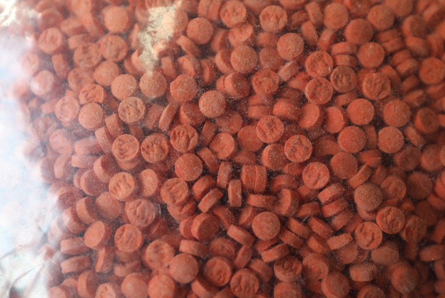 epa11044561 A close up view of some of the methamphetamine pills that were prepared for burning, during the incinerating of seized narcotics ceremony, to mark the government&#039;s wars on drugs campa ...