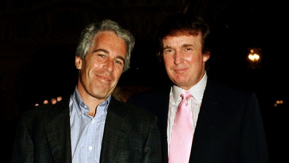 Portrait of American financier Jeffrey Epstein (left) and real estate developer Donald Trump as they pose together at the Mar-a-Lago estate, Palm Beach, Florida on February 22, 1997. (Photo by Davidof ...