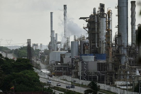 Vehicles drive past the El Palito refinery in Puerto Cabello, Venezuela, Sunday, Dec. 21, 2025. (AP Photo/Matias Delacroix)
Venezuela Oil