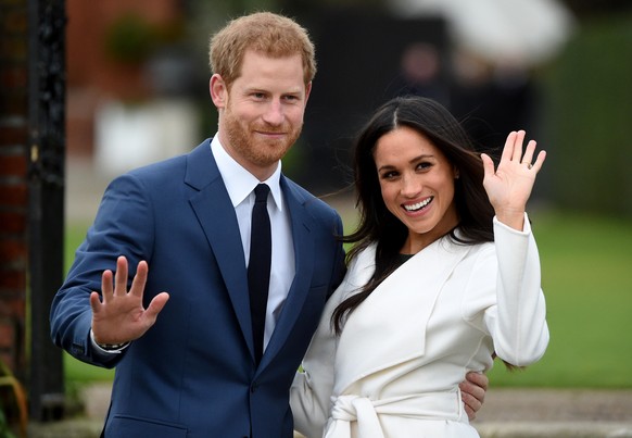 epa07093953 (FILE) Britain's Prince Harry (L) and his fiancee Meghan Markle (R) pose during a photo call after announcing their engagement at the Sunken Garden at Kensington Palace in London, UK, ...