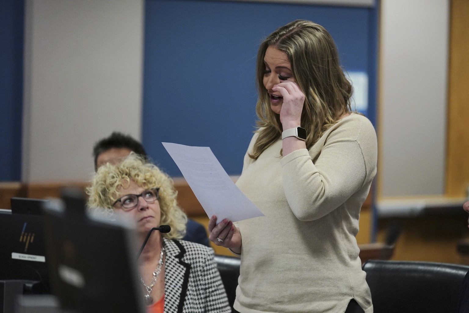 Jenna Ellis reads a statement after Ellis plead guilty to a felony count of aiding and abetting false statements and writings, inside Fulton Superior Court Judge Scott McAfee&#039;s Fulton County Cour ...