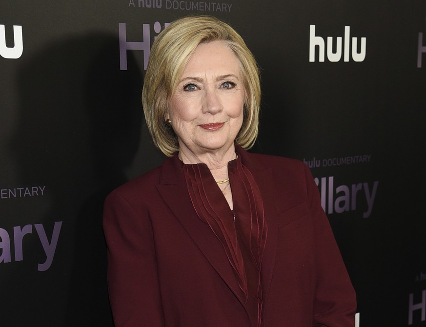 FILE - Former secretary of state Hillary Clinton attends the premiere of the Hulu documentary &quot;Hillary&quot; in New York on March 4, 2020. Clinton is teaming up with her friend Louise Penny on th ...