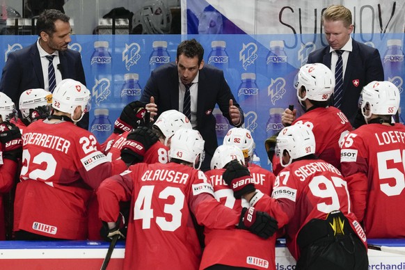 Switzerland&#039;s head coach Patrick Fischer gives instructions to his players during the semi final match between Canada and Switzerland at the Ice Hockey World Championships in Prague, Czech Republ ...