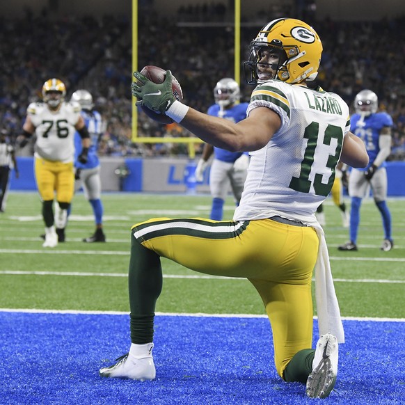 Green Bay Packers wide receiver Allen Lazard reacts after catching a 29-yard pass for a touchdown during the first half of an NFL football game against the Detroit Lions, Sunday, Jan. 9, 2022, in Detr ...