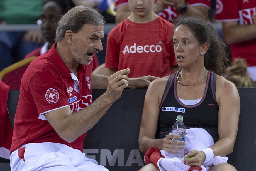 Switzerland&#039;s captain Heinz Guenthardt, left, and Patty Schnyder, right, at the Fed Cup World Group play-off round between Romania and Switzerland in the Sala Polivalenta in Cluj-Napoca, Romania, ...