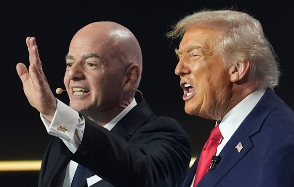 President Donald Trump and FIFA President Gianni Infantino react during the draw for the 2026 soccer World Cup at the Kennedy Center in Washington, Friday, Dec. 5, 2025. (AP Photo/Jacquelyn Martin)
WC ...