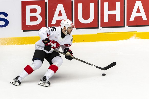 Switzerland&#039;s forward Sven Andrighetto controls the puck, during the IIHF 2025 World Championship preliminary round group B game between Denmark and Switzerland, at the Jyske Bank Boxen, in Herni ...
