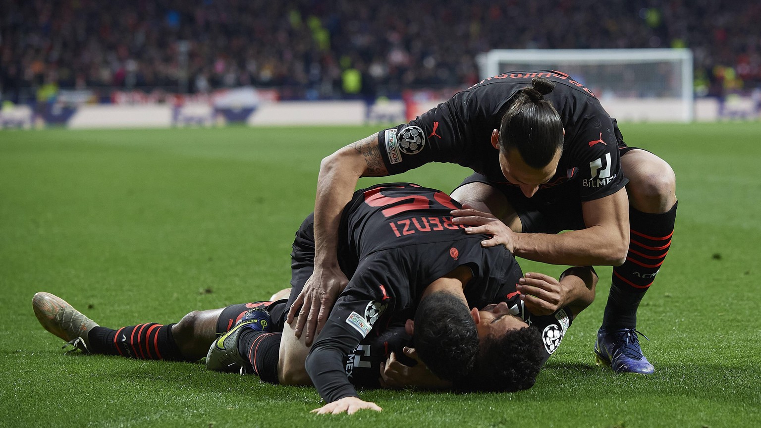 Atletico Madrid v AC Milan: Group B - UEFA Champions League Junior Messias of Milan celebrates with Zlatan Ibrahimovic after scoring his sides first goal during the UEFA Champions League group B match ...