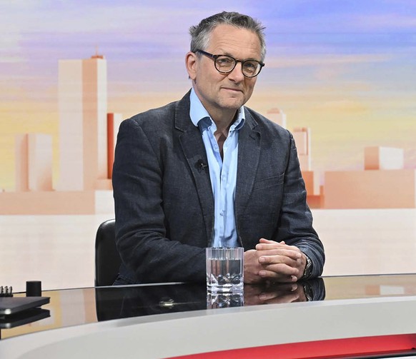 In this undated photo provided by the BBC on Sunday, June 9, 2024, doctor and broadcaster Michael Mosley speaks on Sunday with Laura Kuenssberg. Police said that a body believed to be that of missing  ...