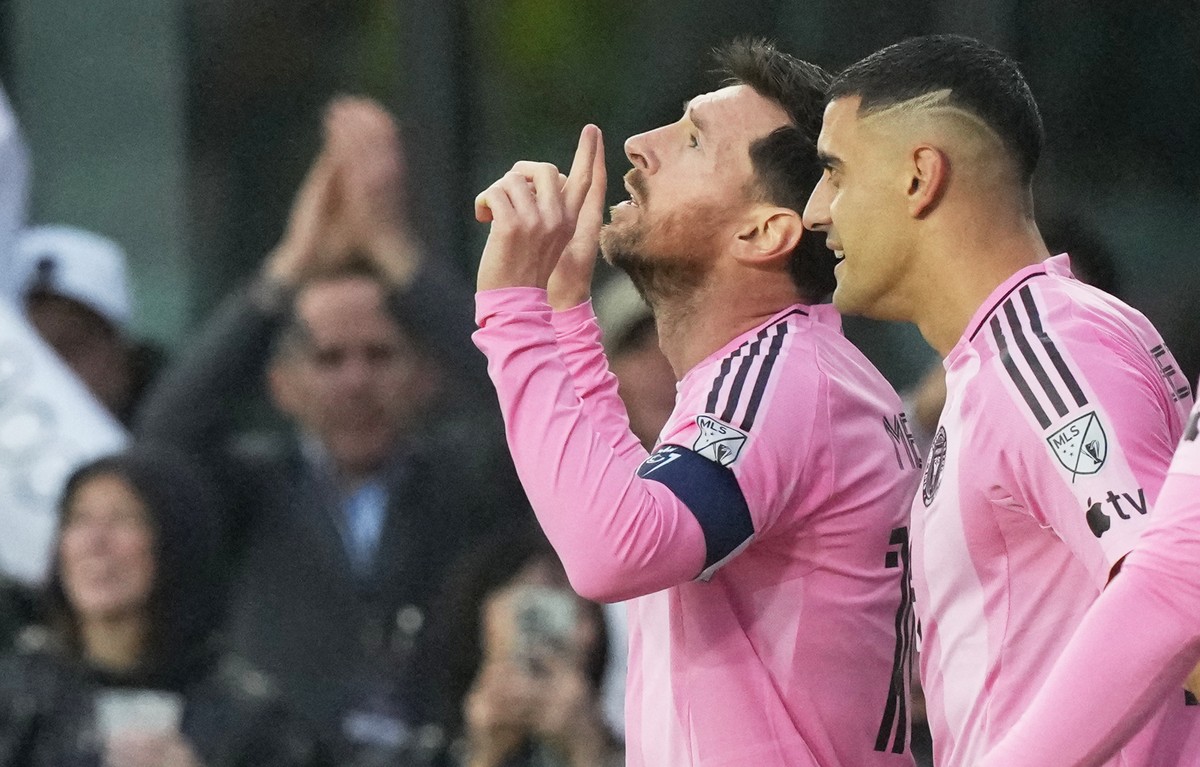 Inter Miami forward Lionel Messi gestures after scoring his 900th goal during a CONCACAF Champions Cup Round of 16 soccer match against Nashville, Wednesday, March 18, 2026, in Fort Lauderdale, Fla. ( ...