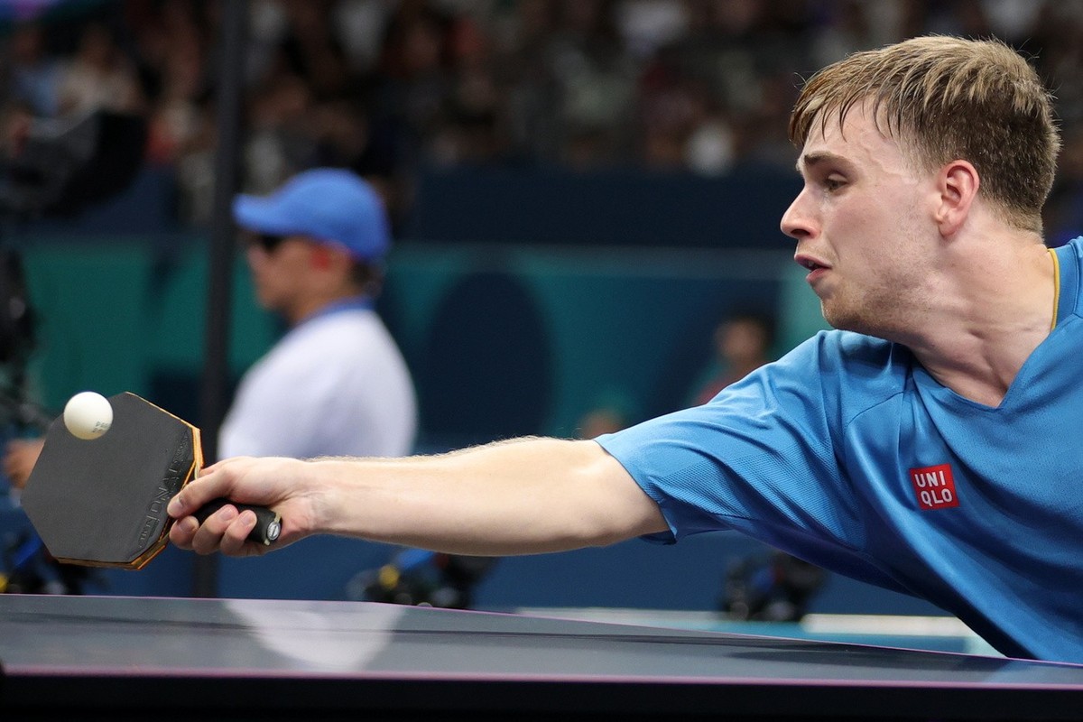 epa11513406 Truls Moregard of Sweden in action against Cheng-Jui Kao of Chinese Taipei (unseen) during their men's singles round of 16 match at the Table Tennis competitions in the Paris 2024 Oly ...