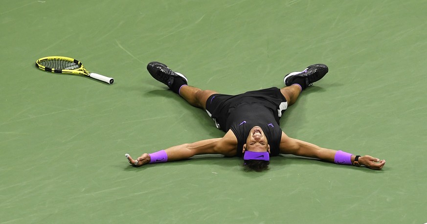 Rafael Nadal, of Spain, reacts after defeating Daniil Medvedev, of Russia, to win the men&#039;s singles final of the U.S. Open tennis championships Sunday, Sept. 8, 2019, in New York. (AP Photo/Sarah ...