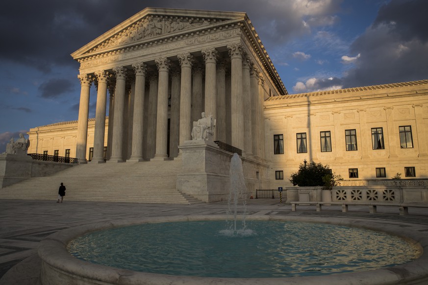 In this Oct. 10, 2017 photo, the Supreme Court in Washington is seen at sunset. The Supreme Court says whistleblower protections passed by Congress after the 2008 financial crisis only apply to people ...