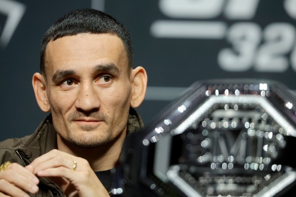 UFC lightweight fighter Max Holloway attends a news conference for UFC 326 at MGM Grand Garden Arena, Thursday, March 5, 2026, in Las Vegas. (Steve Marcus/Las Vegas Sun via AP)
Max Holloway