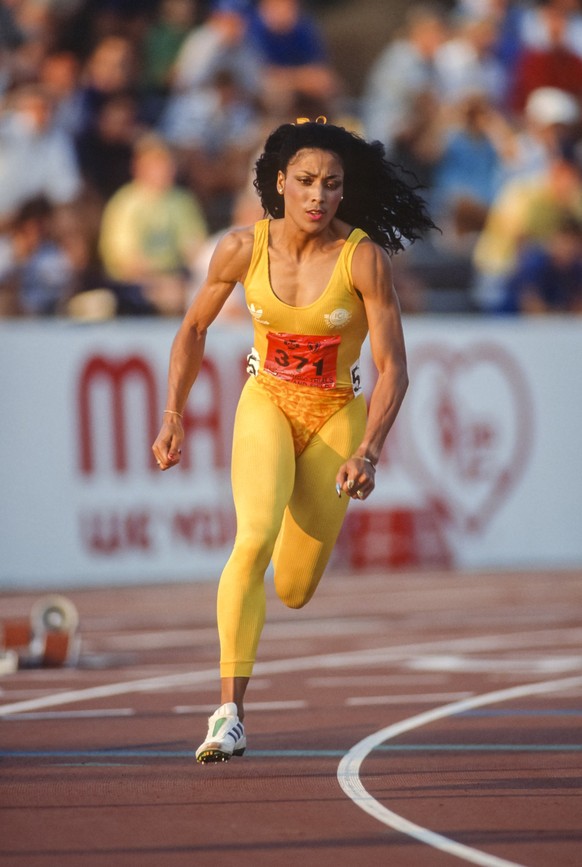 INDIANAPOLIS, IN - JULY 22: Florence Griffith Joyner #371 of the USA competes in the quarterfinal round of the Women&#039;s 200 meter event of the 1988 USA Track and Field Olympic Trials held July 22, ...