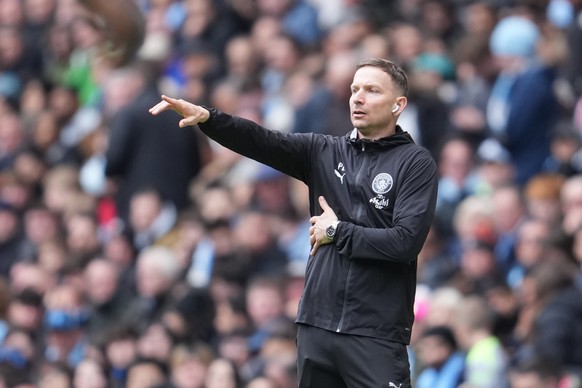 Manchester City's assistant manager Pepijn Lijnders gives instructions during the FA Cup quarter-final soccer match between Manchester City and Liverpool in Manchester, England, Saturday, April 4 ...