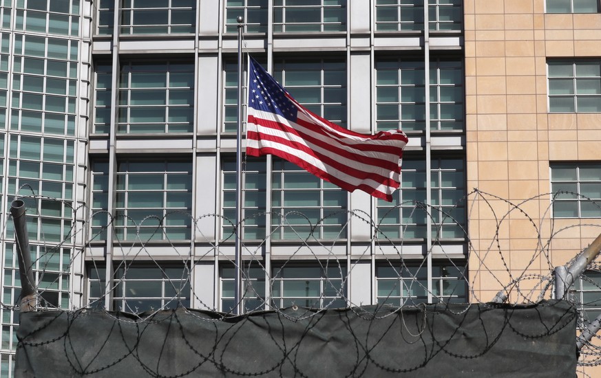 epa07255497 (FILE) - A flag of the USA waves in front of the Embassy of the United States of America in Moscow, Russia, 30 March 2018, (reissued 31 December 2018). Media reports state on 31 December 2 ...