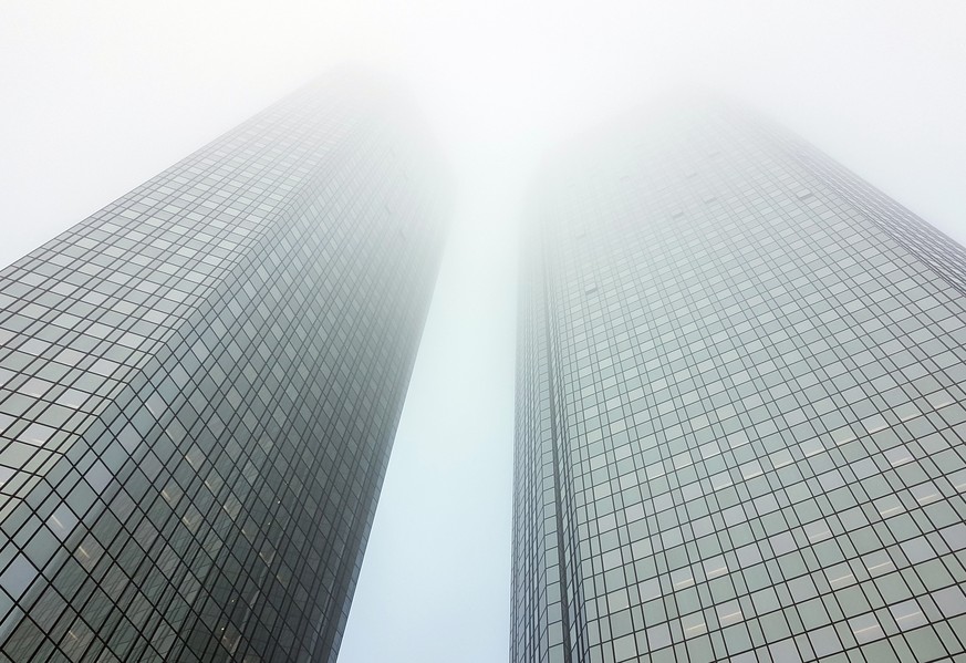 epa08686199 (FILE) - An exterior view of the entrance of the Deutsche Bank corporate headquarters building on a foggy day in Frankfurt am Main, Germany, 21 February 2018 (reissued 21 September 2020).  ...