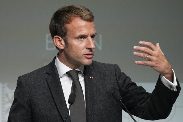 French President Emmanuel Macron delivers his speech at the Quai Branly museum Wednesday, Oct. 27, 2021 in Paris. France next month will hand over 26 looted colonial-era artifacts to the government of ...