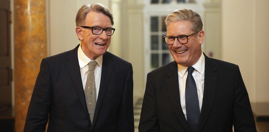 British Prime Minister Keir Starmer, right, talks with Britain's ambassador to the United States Peter Mandelson during a welcome reception at the ambassador's residence on Wednesday, Feb. 2 ...
