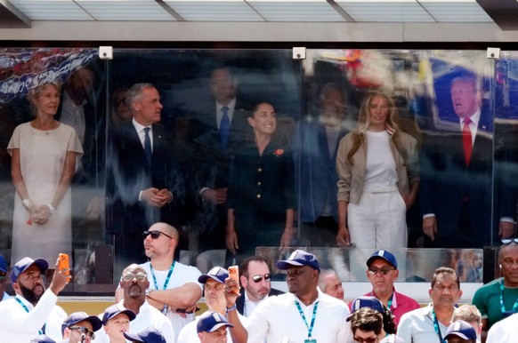 From left, Diana Fox Carney, Canadian Prime Minister Mark Carney, Mexico President Claudia Sheinbaum Pardo, first lady Melania Trump and President Donald Trump watch the FIFA World Cup final in East R ...