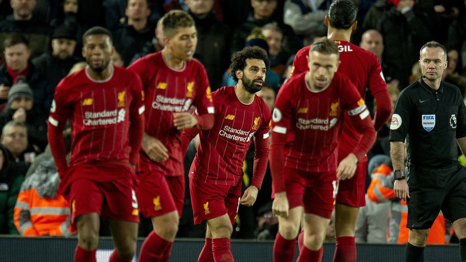 epa08098975 Liverpool&#039;s Mohamed Salah (C) celebrates after scoring the first goal during the English Premier League soccer match between Liverpool and Sheffield United at Anfield, Liverpool, Brit ...