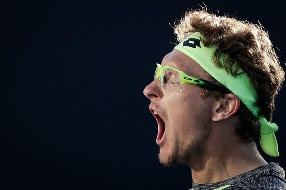 epa05737559 Denis Istomin of Uzbekistan reacts after winning against Pablo Carreno Busta of Spain in a Men&#039;s Singles third round match at the Australian Open Grand Slam tennis tournament in Melbo ...