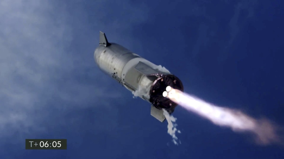 In this image from video made available by SpaceX, one of the company's Starship prototypes fires its thrusters as it lands during a test in Boca Chica, Texas, on Wednesday, March 3, 2021. The tw ...