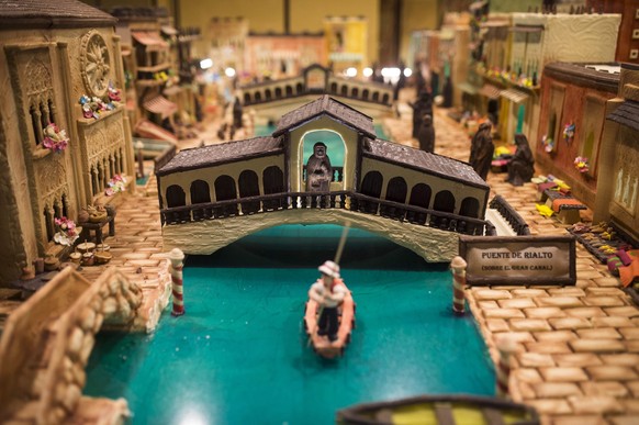 epa05673948 A view of the Rialto Bridge in Venice made with chocolate as part of the Nativity Scene sculpted by Galleros Artesanos de Rute pastry masters, in Rute, Cordoba, Andalusia, Spain, 13 Decemb ...