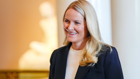 FILE - Norway's Crown Princess Mette Marit smiles during a reception for Norwegian athletes who competed in the Milan Cortina Paralympics, in Oslo, Friday, April 10, 2026. (Lise Åserud/NTB Scanpi ...
