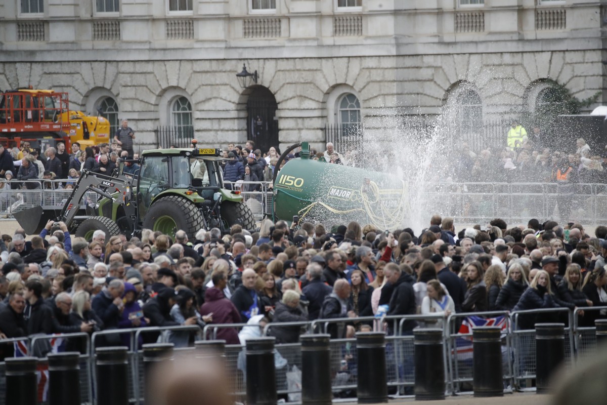 epa10192755 The street is cleaned in advance of the State Funeral Procession of Queen Elizabeth II in London, Britain, 19 September 2022. Britain's Queen Elizabeth II died at her Scottish estate, ...