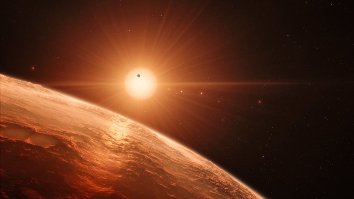 epa05808994 An undated handout photo made available by the European Southern Observatory (ESO) on 22 February 2017 shows an artist's impression of the view from the surface of one of the planets  ...