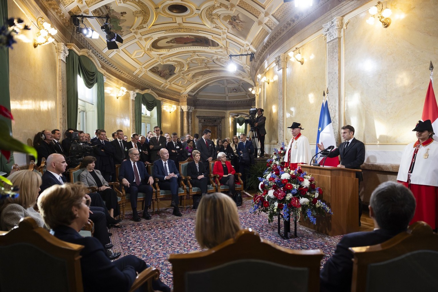 French President Emanuel Macron speaks during the official discourse in the Federal Palace, the Swiss Parliament building, in Bern, Switzerland, Wednesday, November 15, 2023. French President Emanuel  ...