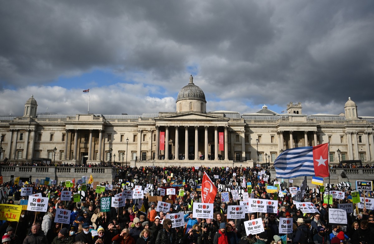 epa09805499 Protesters march on Trafalgar Square during a demonstration organised by the Stop the War Coalition against NATO and Russia's military operation Ukraine, in London, Britain, 06 March  ...