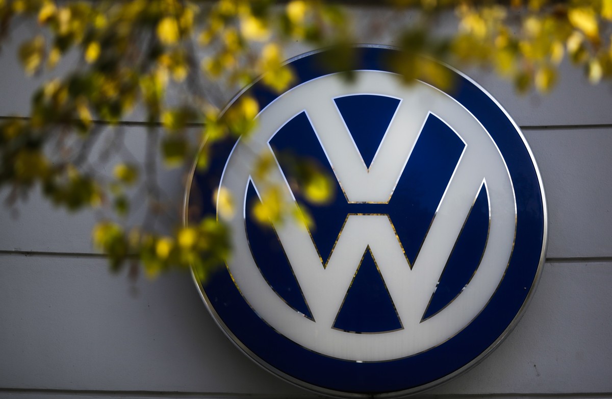 FILE - In this Oct. 5, 2015 file photo the VW sign of Germany's car company Volkswagen is displayed at the building of a company's retailer in, Berlin, Germany. Diesels bought back by Volksw ...