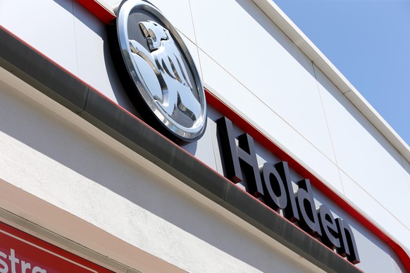 epa08223317 A Holden sign hangs at a dealership in Adelaide, Australia, 17 February 2020. On 17 February, General Motors (GM) announced that it would retire the Holden brand in both Australia and New  ...