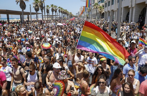 FILE - In this June 25, 2021 file photo, people participate in the annual Pride Parade, in Tel Aviv, Israel. On Sunday, July 11, 2021, Israel