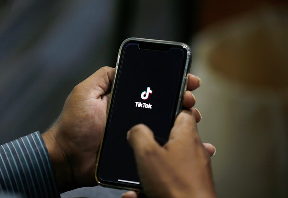 FILE - In this July 21, 2020 file photo, a man opens social media app 'TikTok' on his cell phone, in Islamabad, Pakistan. (AP Photo/Anjum Naveed, File)
Pakistan-Social Media
