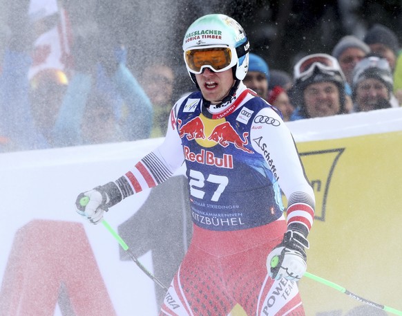 Austria&#039;s Otmar Striedinger reacts at the finish area of an alpine ski, men&#039;s World Cup downhill, in Kitzbuehel, Austria, Friday, Jan. 25, 2019. (AP Photo/Alessandro Trovati)