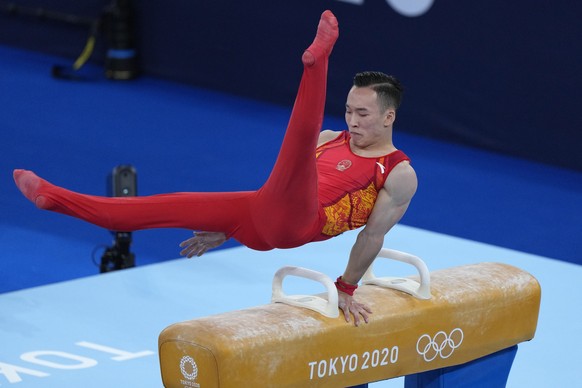 Xiao Ruoteng, of China, performs on the pommel horse during the artistic gymnastic men&#039;s all-around final at the 2020 Summer Olympics, Wednesday, July 28, 2021, in Tokyo. (AP Photo/Gregory Bull)