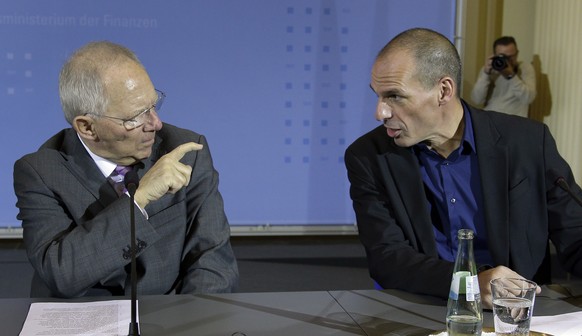 FILE - In this Feb. 5, 2016 file photo, German Finance Minister Wolfgang Schaeuble, left, and the Finance Minister of Greece, Yanis Varoufakis, right, talk prior to a joint press conference as part of ...