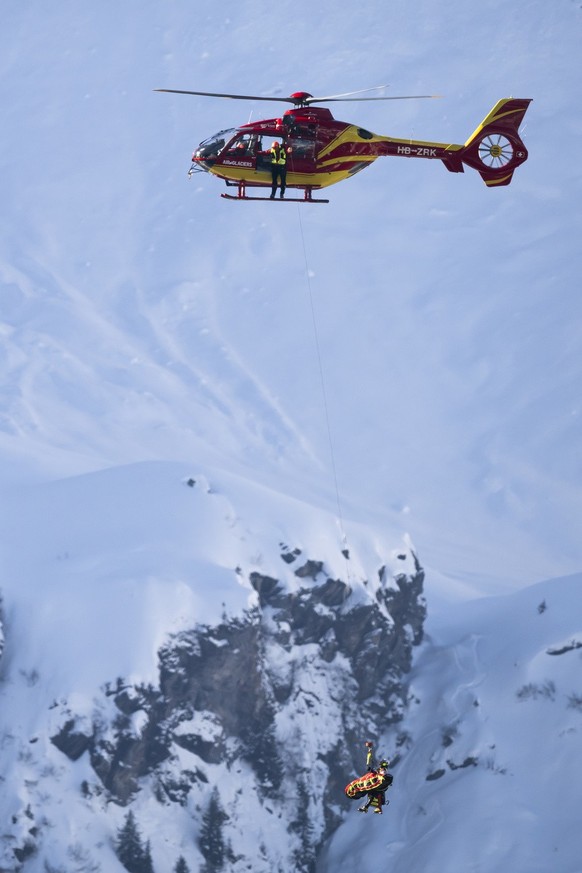 An helicopter evacuates injured skier Alexis Pinturault of France during the men&#039;s super-g race at the Alpine Skiing FIS Ski World Cup in Wengen, Switzerland, Friday, January 12, 2024. (KEYSTONE/ ...
